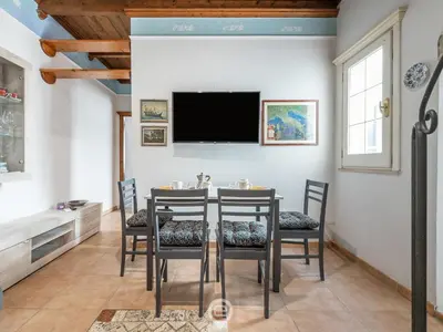 TV o dispositivi per l'intrattenimento presso La Dama dei Fiori Apartment