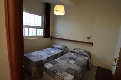 Letto o letti in una camera di Villa Bulcrini