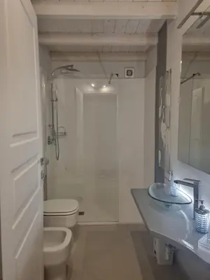 Bagno di Luxury Apple Room Apartment Cagliari