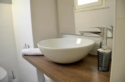 Bagno di Luxury Apple Room Apartment Cagliari