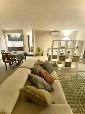 Area soggiorno di Loft incantevole a Cagliari in zona residenziale