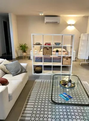 Area soggiorno di Loft incantevole a Cagliari in zona residenziale