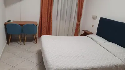 Letto o letti in una camera di Hotel 4 Mori