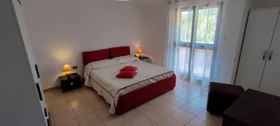 Letto o letti in una camera di Grazioso e confortevole attico, costa sud-ovest