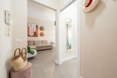 Area soggiorno di Corner Apartment via Italia