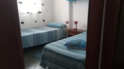 Letto o letti in una camera di Casa Leonardo