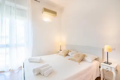 Letto o letti in una camera di Attico Luce e Colori - Terrazza Vista Mare - 5 Bdr