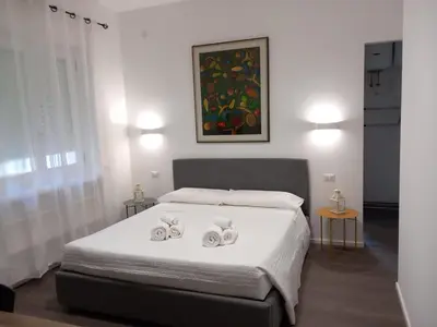 Letto o letti in una camera di Dante 134 Rooms