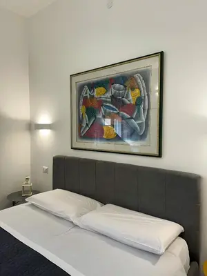 Letto o letti in una camera di Dante 134 Rooms