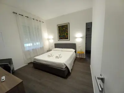 Letto o letti in una camera di Dante 134 Rooms