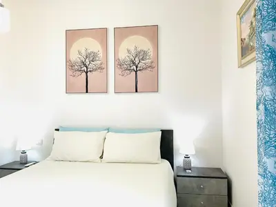 Letto o letti in una camera di Villa Kate Pula Sardegna