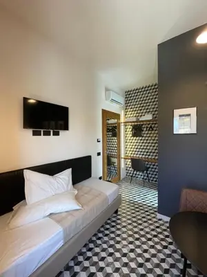 Letto o letti in una camera di IKNOS Accommodation