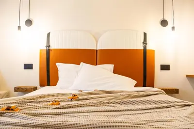 Letto o letti in una camera di IKNOS Accommodation