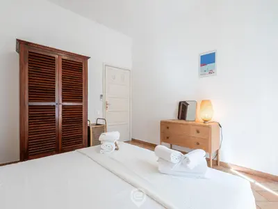 Letto o letti in una camera di Casa Flamingo