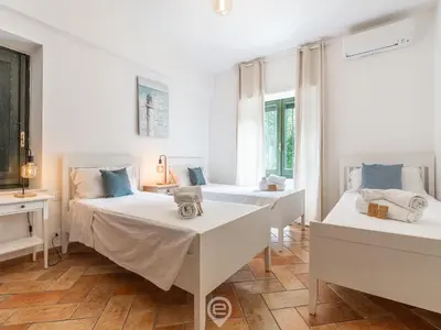Letto o letti in una camera di Casa Flamingo