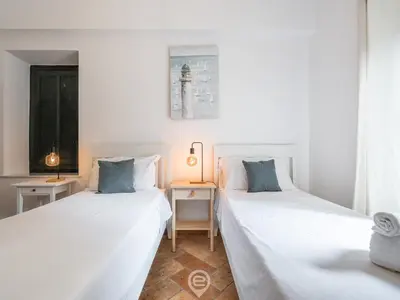 Letto o letti in una camera di Casa Flamingo