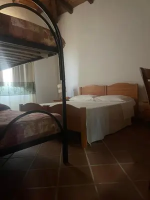 Letto o letti in una camera di Hotel Su Nuraxi