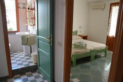 Letto o letti in una camera di Guardia dei Mori