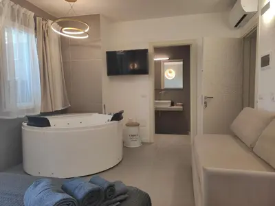 TV o dispositivi per l'intrattenimento presso Live Home Rooms