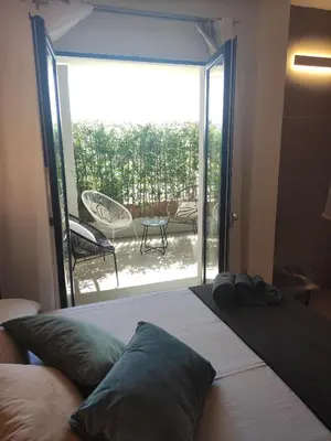 Letto o letti in una camera di Live Home Rooms
