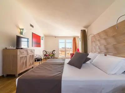 Letto o letti in una camera di Nichotel