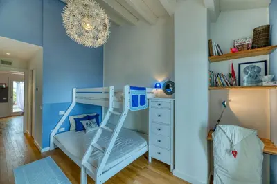 Letto o letti in una camera di La Casa degli Ulivi appartamento in villa con patio