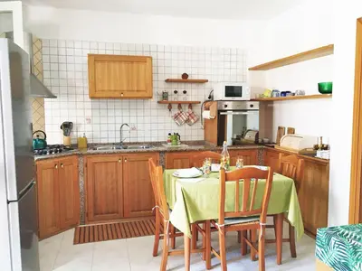 Cucina o angolo cottura di Bougainvillea Home - Ospedale Policlinico Monserrato
