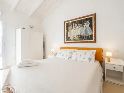 Letto o letti in una camera di Casa Giovele