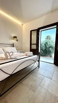 Letto o letti in una camera di La Casa di Natalie