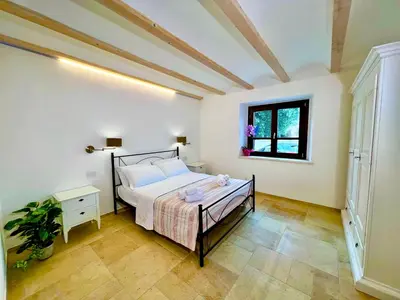 Letto o letti in una camera di La Casa di Natalie
