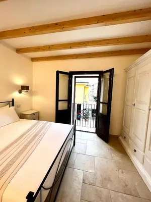 Letto o letti in una camera di La Casa di Natalie