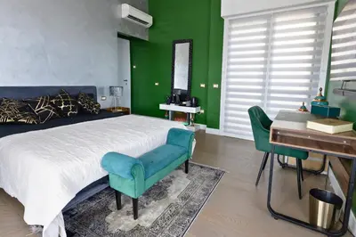 Letto o letti in una camera di Penthouse genneruxi