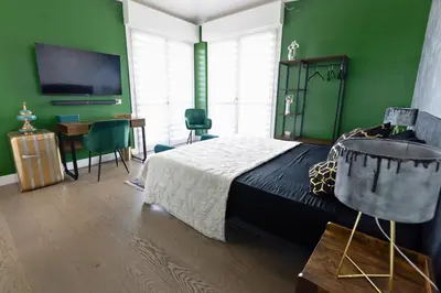 Letto o letti in una camera di Penthouse genneruxi