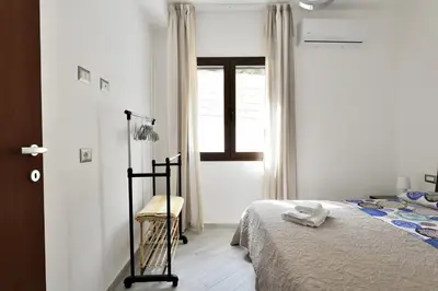 Letto o letti in una camera di SARDEGNA 