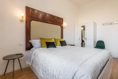 Letto o letti in una camera di Suite Speciosa Bestvacationever
