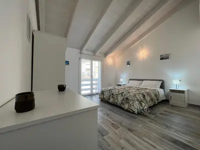 Letto o letti in una camera di Casa Sylvia