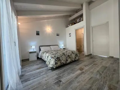 Letto o letti in una camera di Casa Sylvia