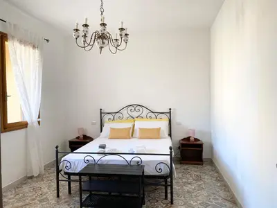 Letto o letti in una camera di Villa Franca
