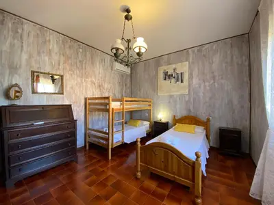 Letto o letti in una camera di Villa Franca