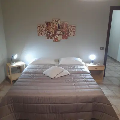Letto o letti in una camera di Appartamento luminoso e spazioso al primo piano