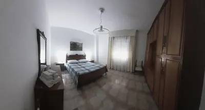 Letto o letti in una camera di Appartamento luminoso e spazioso al primo piano