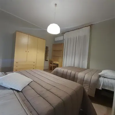 Letto o letti in una camera di Appartamento luminoso e spazioso al primo piano