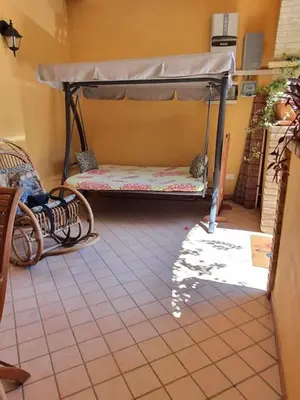 Letto o letti in una camera di Villasimius P.Terra - Centro Paese
