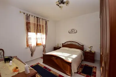 Letto o letti in una camera di Appartamento Vacanza