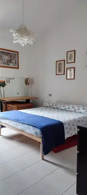 Letto o letti in una camera di La casa delle tortamele