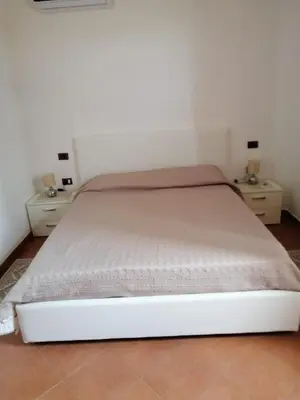 Letto o letti in una camera di LA Tavola Ristorante Pizzeria Da Rino & Figli