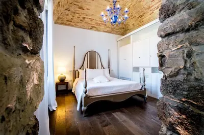 Letto o letti in una camera di Faro Capo Spartivento