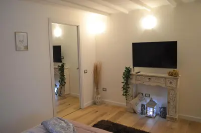 TV o dispositivi per l'intrattenimento presso Domu 600 - Suite mini appartamento Cagliari centro storico