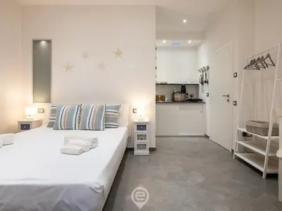 Letto o letti in una camera di Studio 74