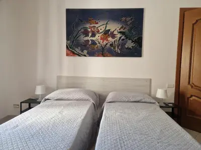 Letto o letti in una camera di La Casa di Angelica